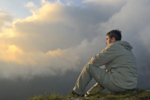 healthy young man practice youga in height mountain at early morning and sunrise