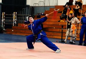 Burak YIldiz performs Rising Block Spear from Northern Shaolin Kung Fu.