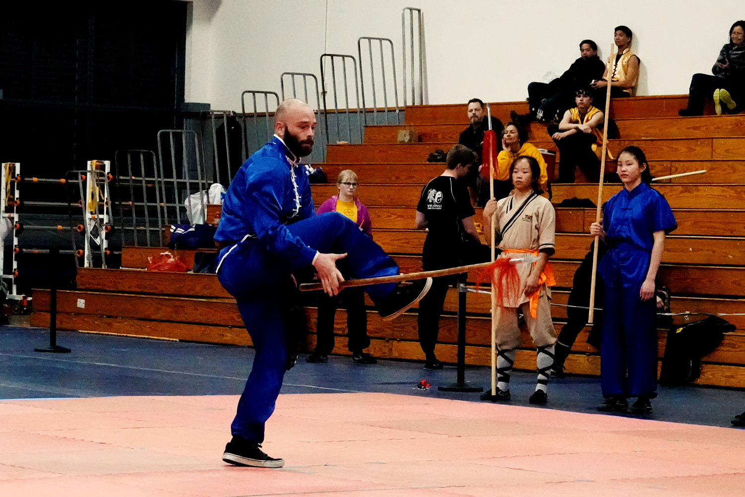 Joseph Vigneri performs Plum Blossom Spear from the Lohan or Buddha Palm Style of Kung Fu. In this trick move Vigneri is tossing the spear under one leg to catch it with the other hand in a tricky thrust.