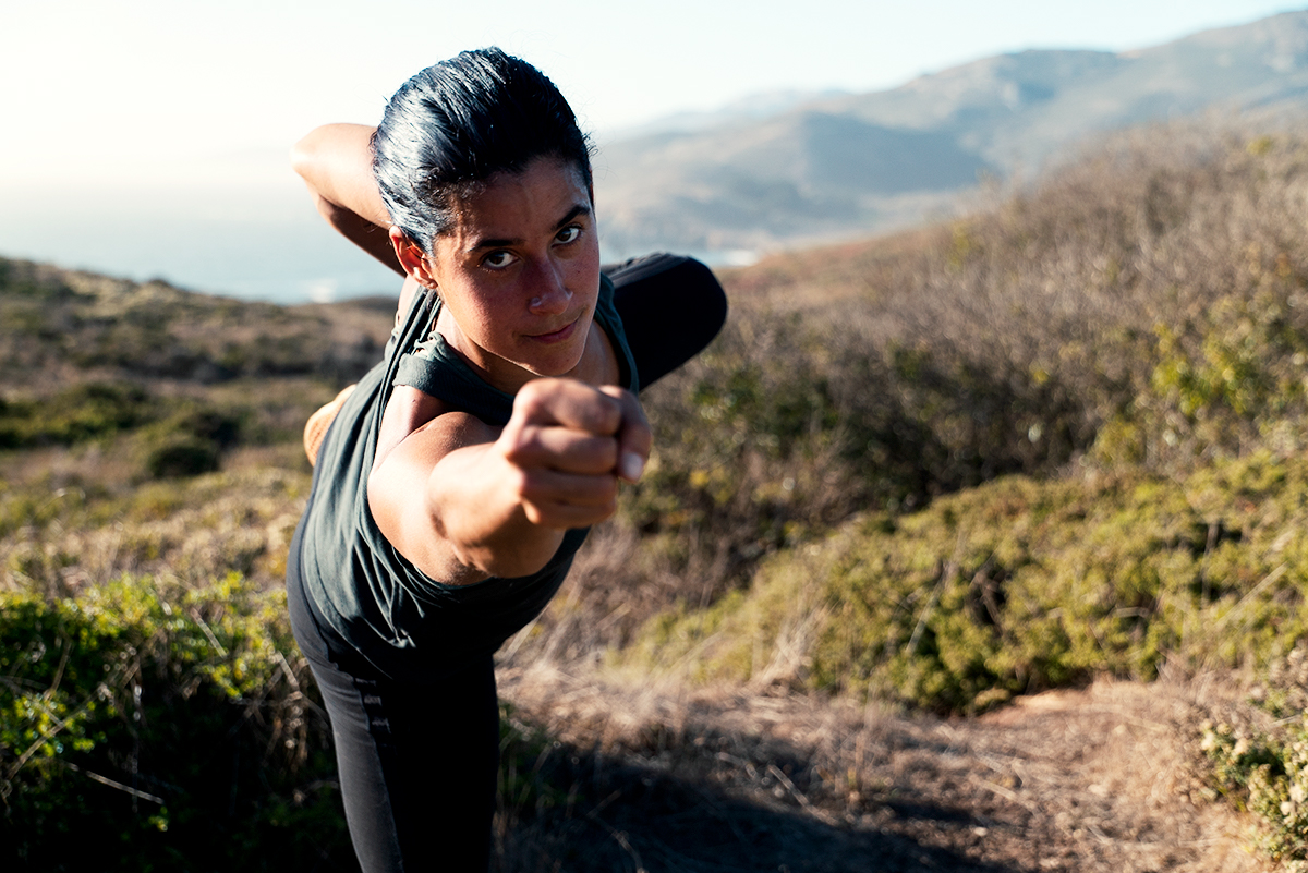 Ila Cantor performs a stance and controls her breathing to stay grounded.